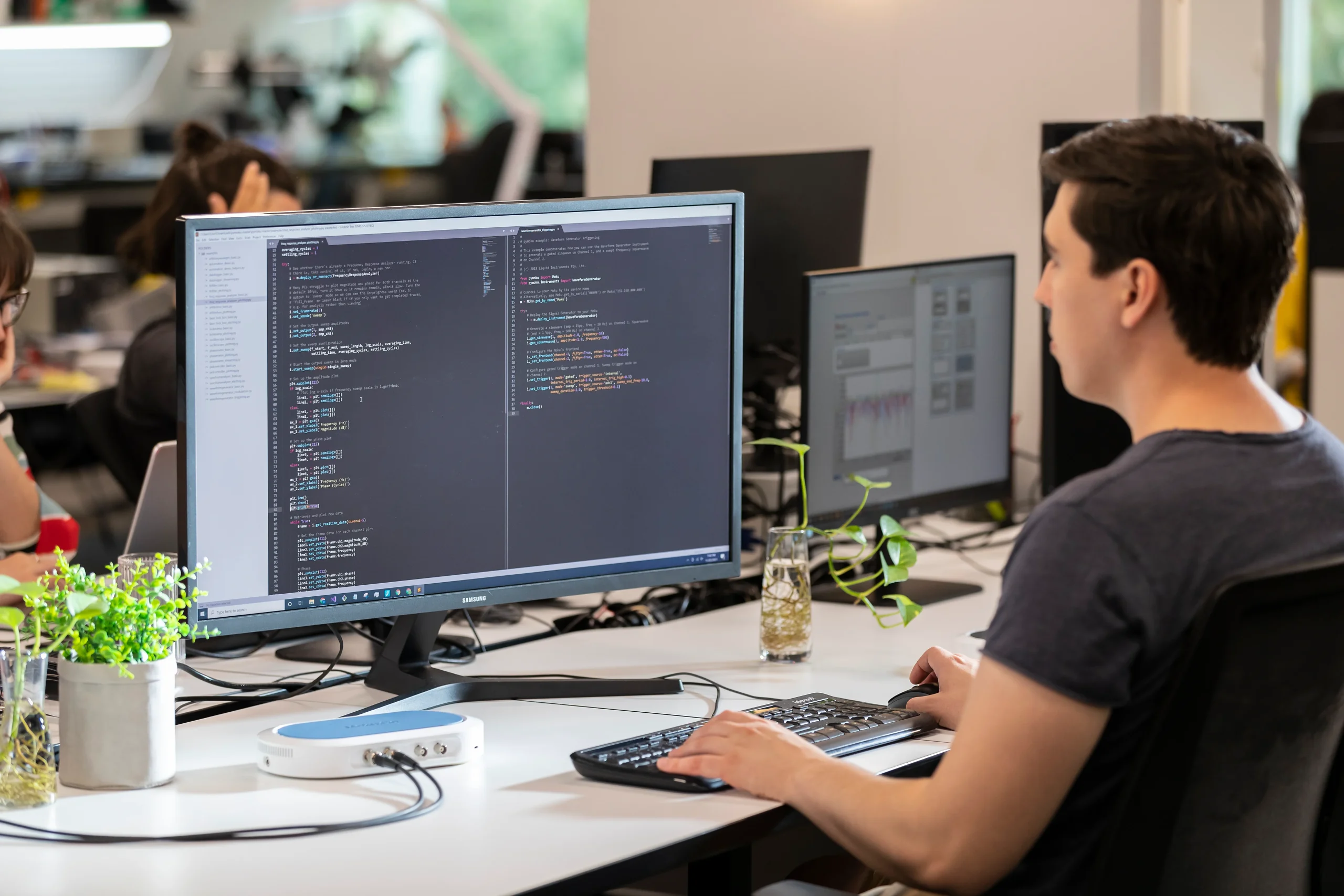 Engineer working on neural network training model with python